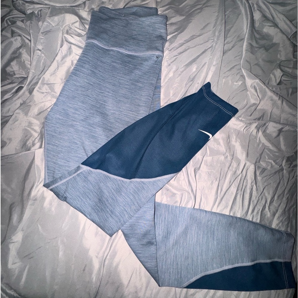 Women’s Nike leggings slight rip at waist as shown in picture